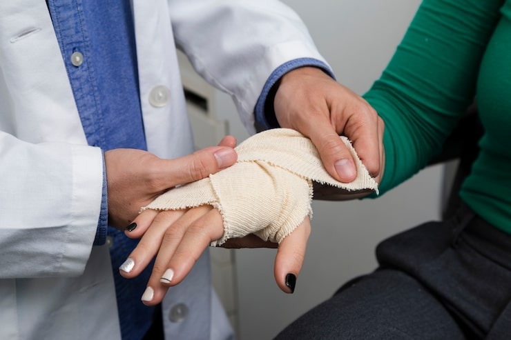 close-up-doctor-bandaging-arm_23 - Copy